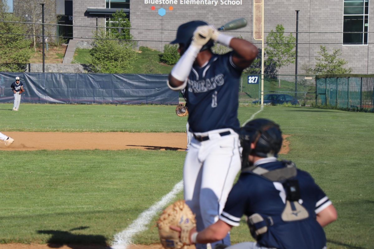 Player Miguel Fajardo-Luis getting ready to pitch.