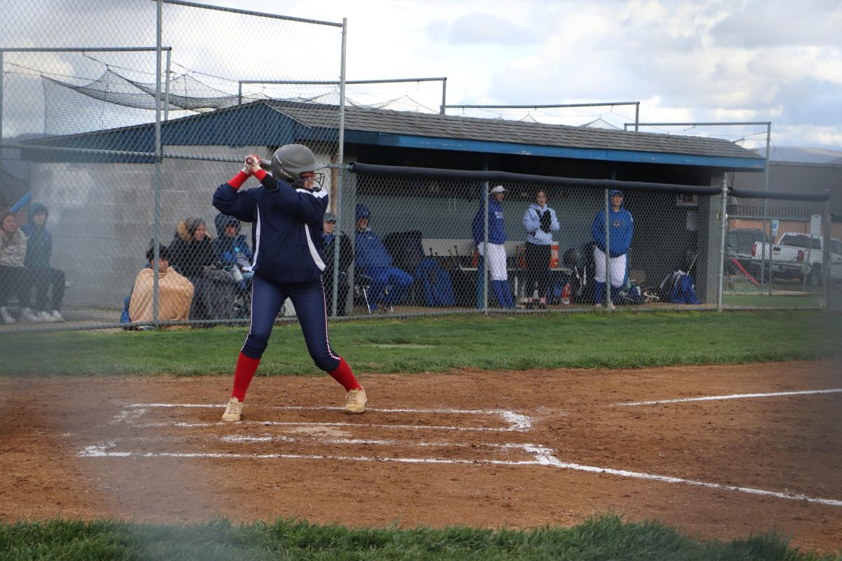 Senior Mia Rodamer bats in the first inning at Spotswood High School. 