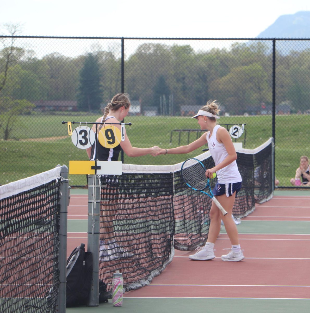 Senior Sophia Pimentel Yoder shakes her opponents hand after winning her first match. 4-19