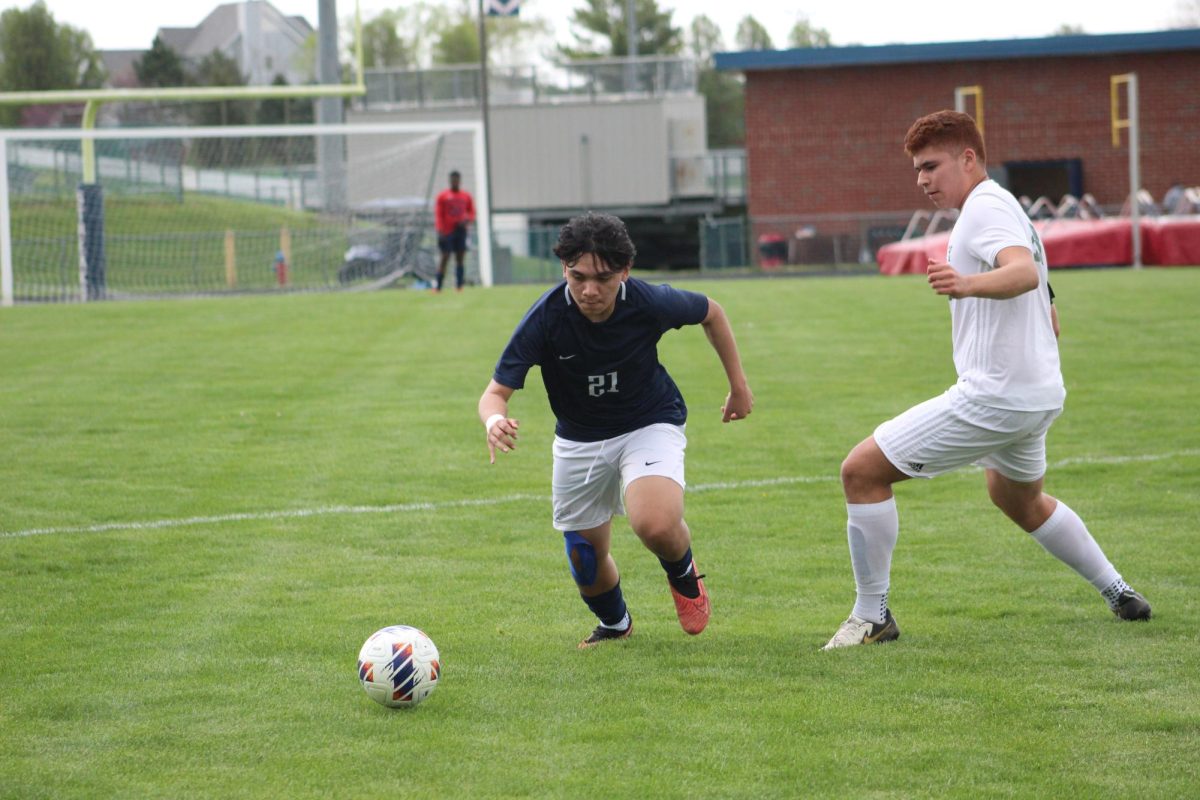 Freshman Jeferson Rivera taking on a defender down the line.