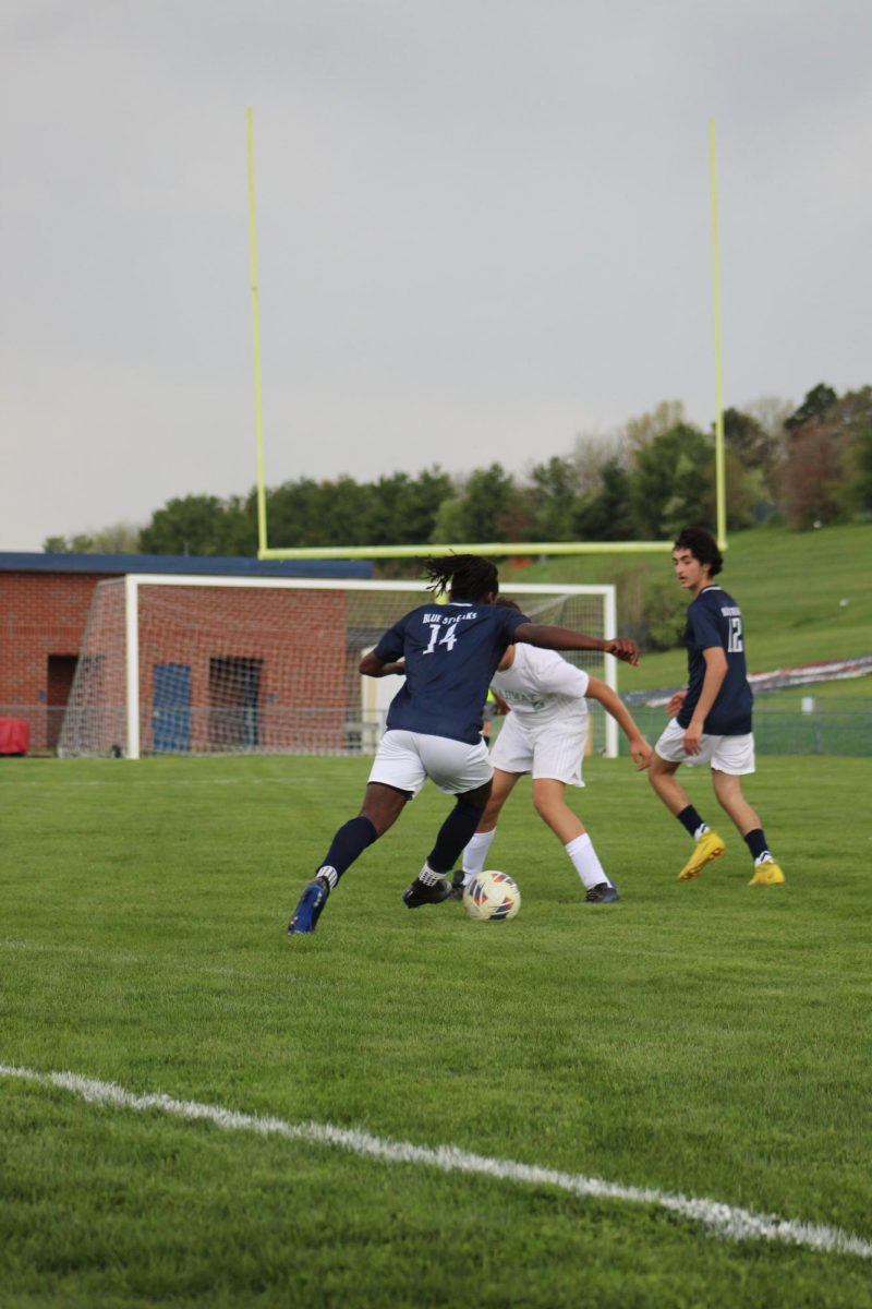 Sophomore Michael Bayongwa cuts into the inside of a defender.