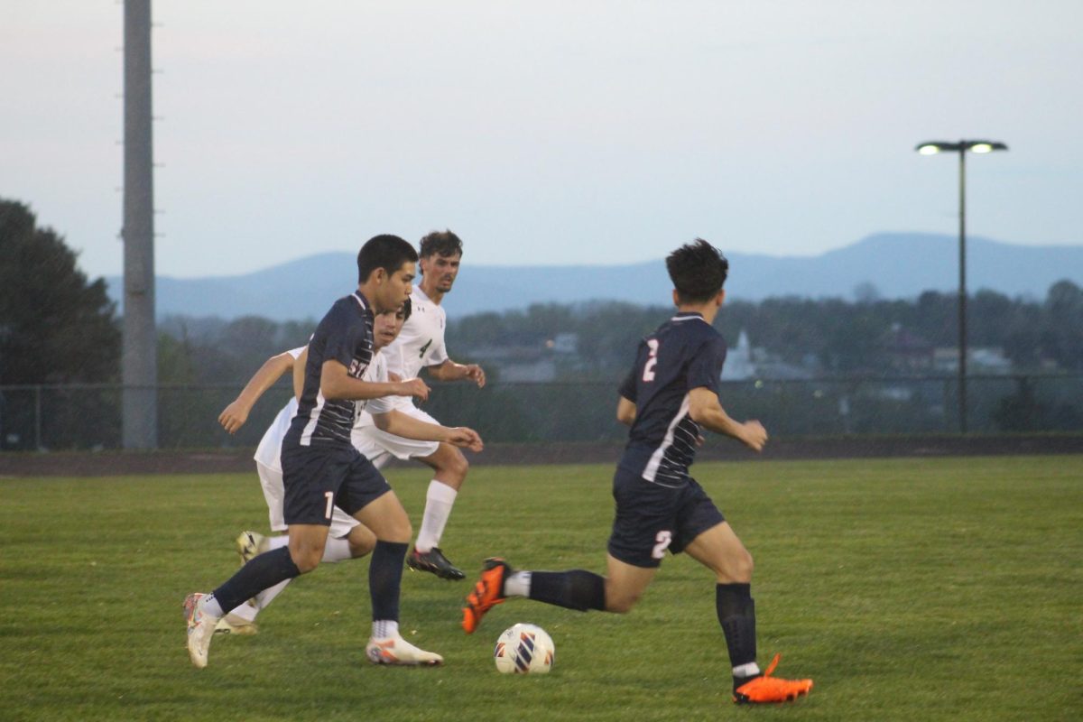 Sophomore Edison Rattana dribbling up the field.