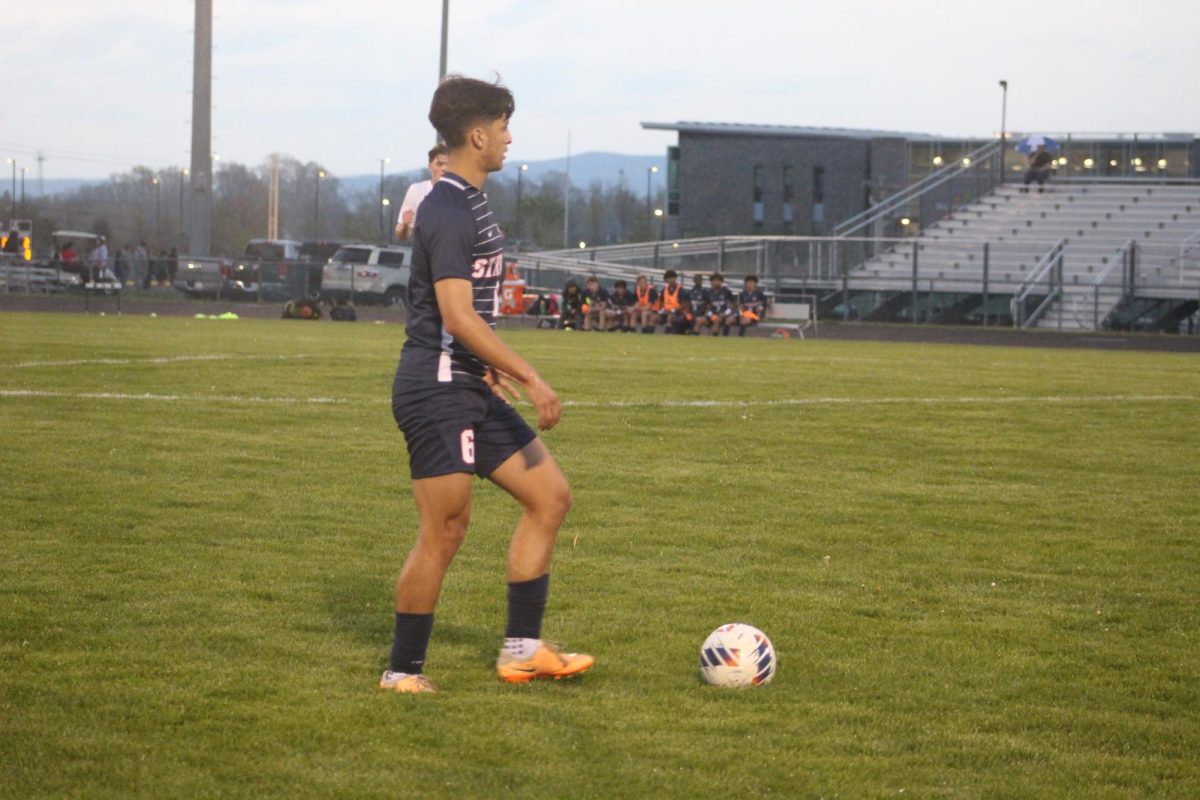 Captain Miguel Orsoto looking for a player to past it too.