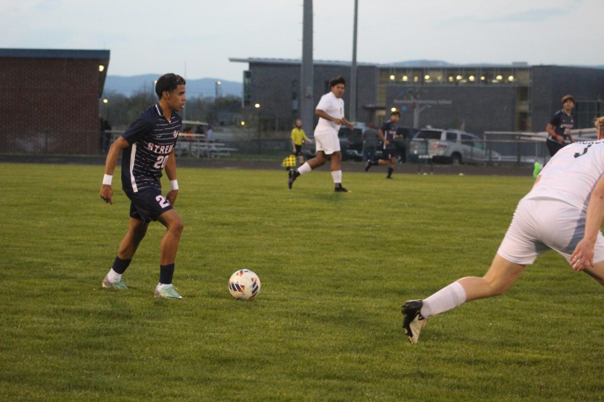 Osvin Murillo going up with the ball to create a attack.
