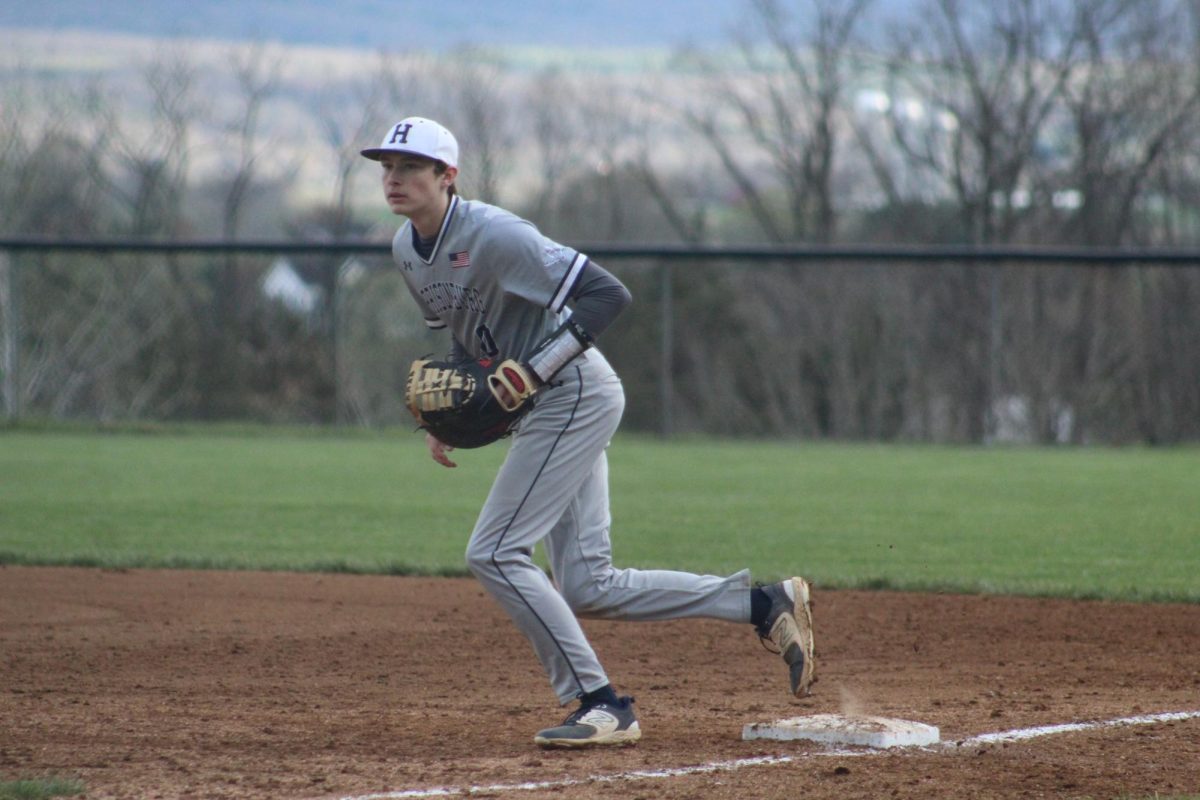 Junior Anson Wolter runs after the ball.