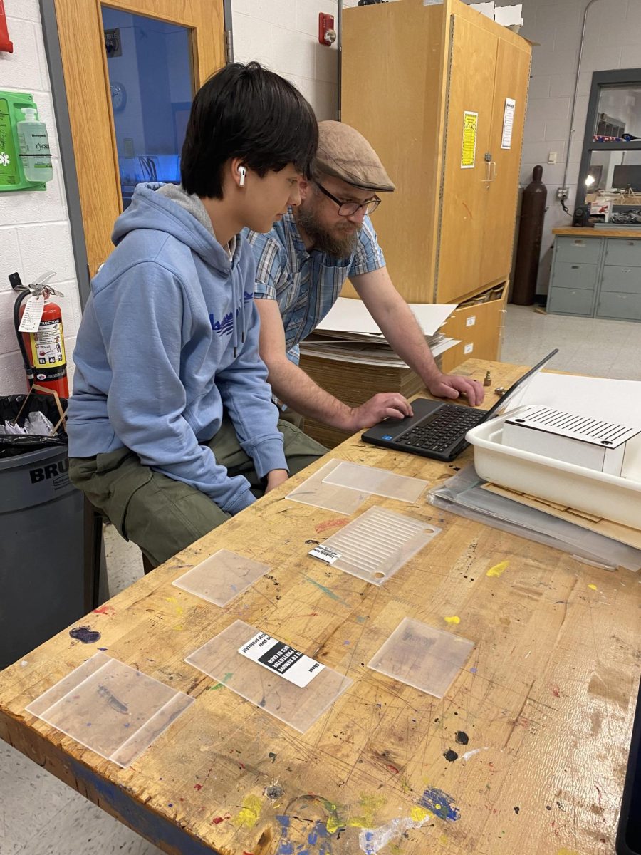 Brian Milstead gets help from his innovations teacher