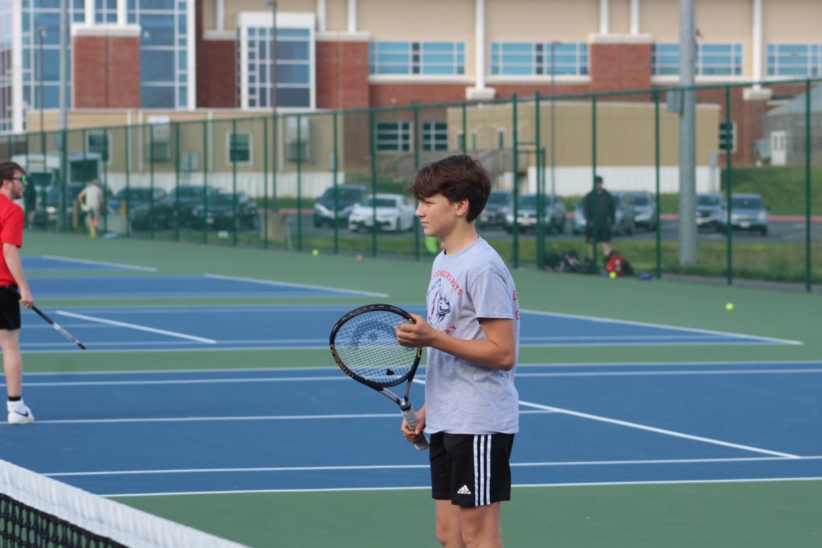 Freshman Lucas Maynard plays an exhibition match against East Rock.