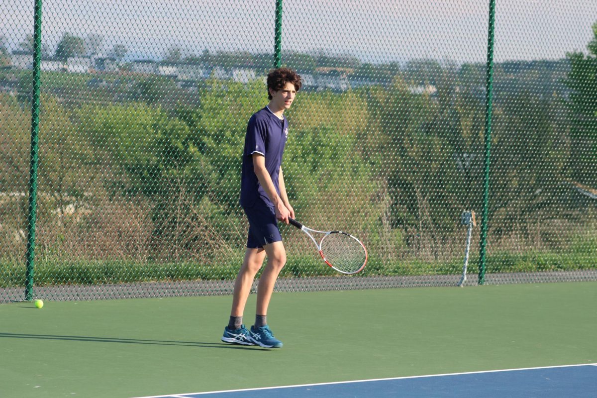 Sophomore Tristan Nussbaum gets prepared to receive a serve. 