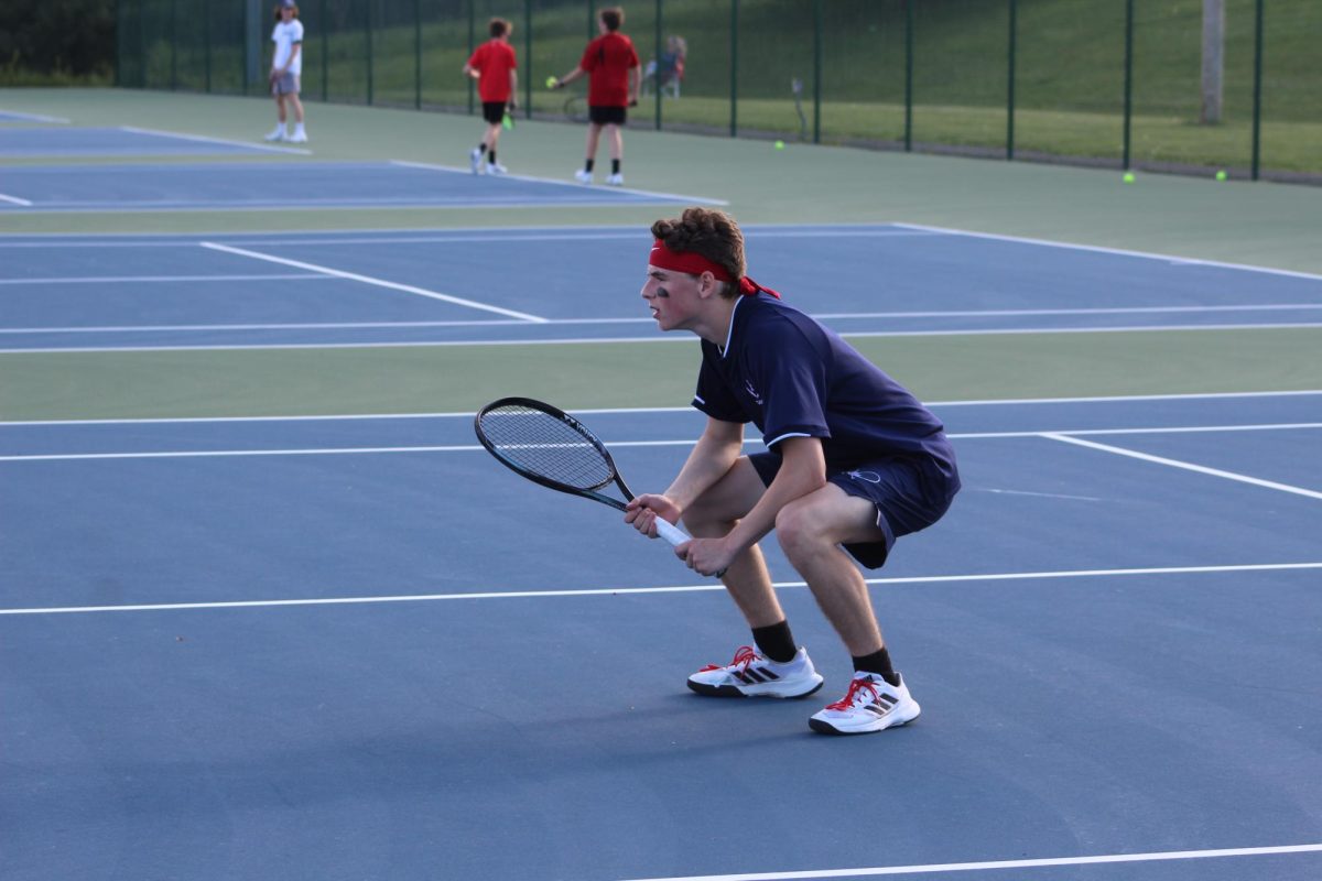 Junior Louis Gibson gets in ready position. 