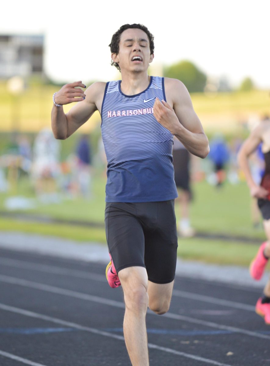 Senior Ransom Satterfield crosses the finish line after his race. 