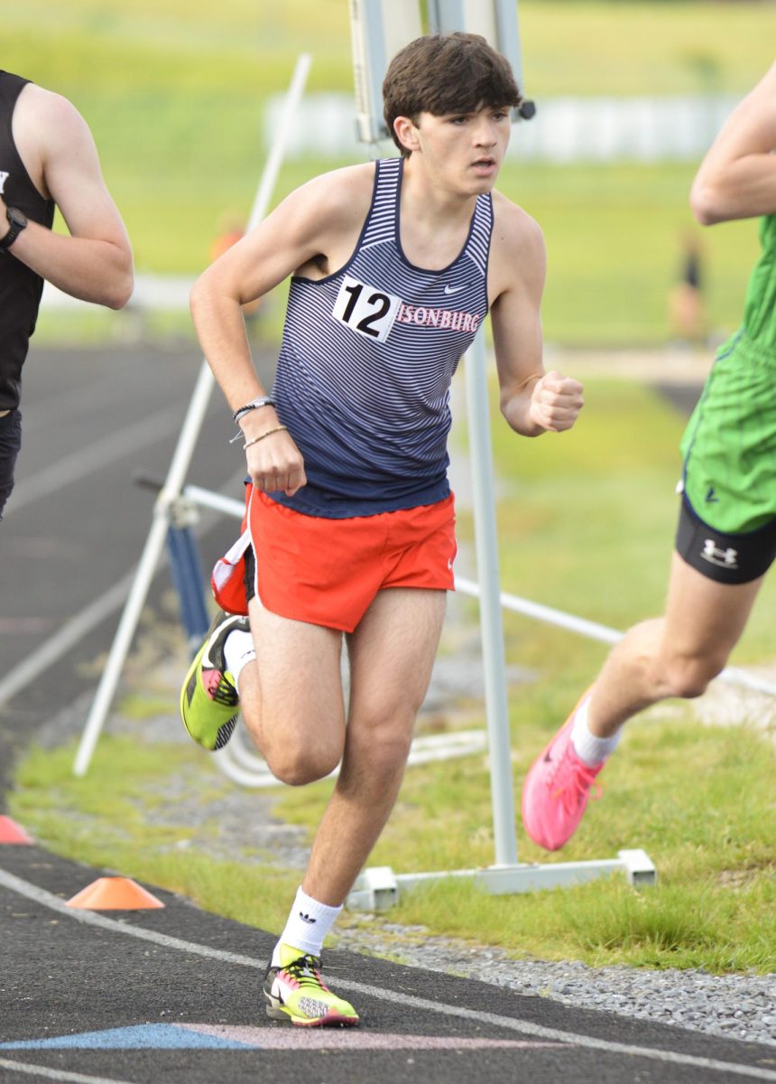 Freshman Declan Young runs the final stretch of his event. 