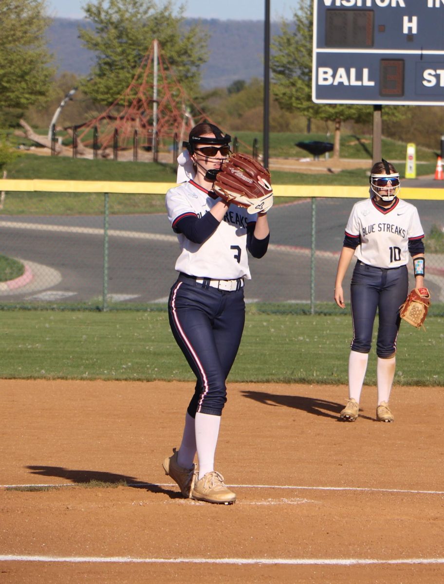 Senior Camryn Johnson windes up to pitch  against Staunton at a home game. 