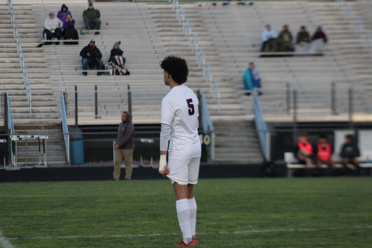 Freshmen William Diaz looking forward up the field.