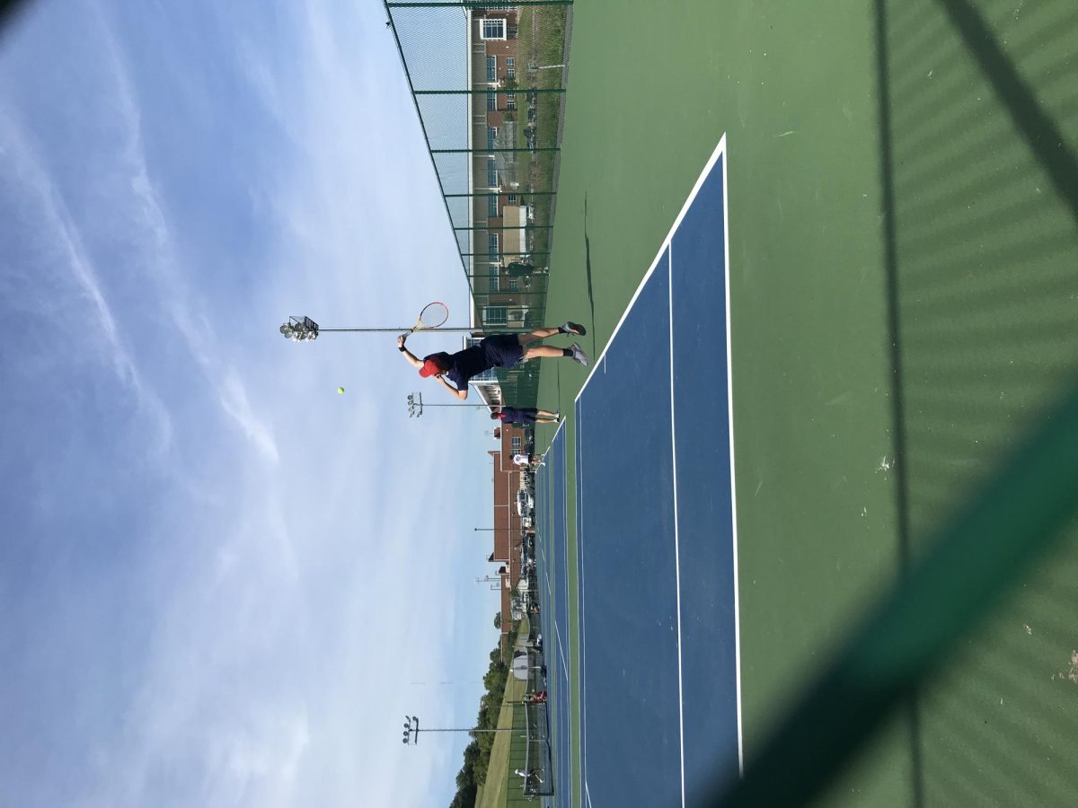 Drew Lankford serves against the Massaponax 4th seed player.