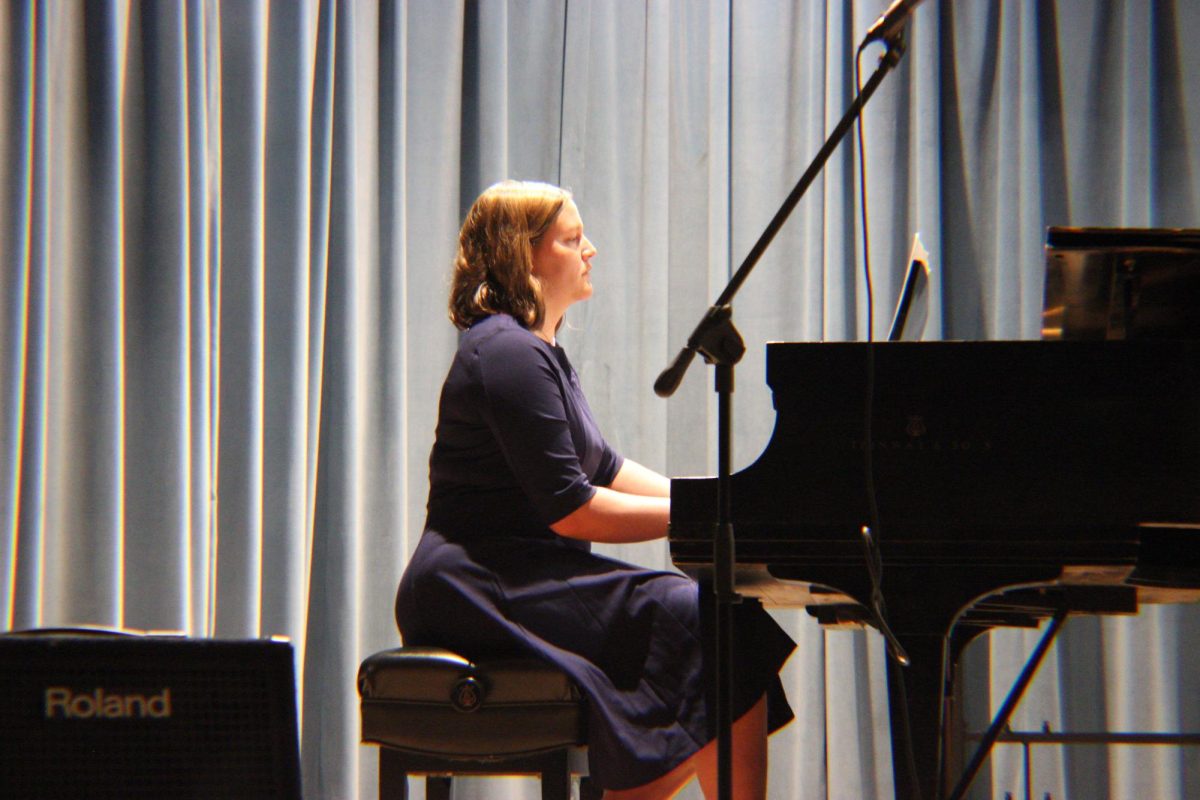 Senior Johannah Mayfield performs a solo on the piano.