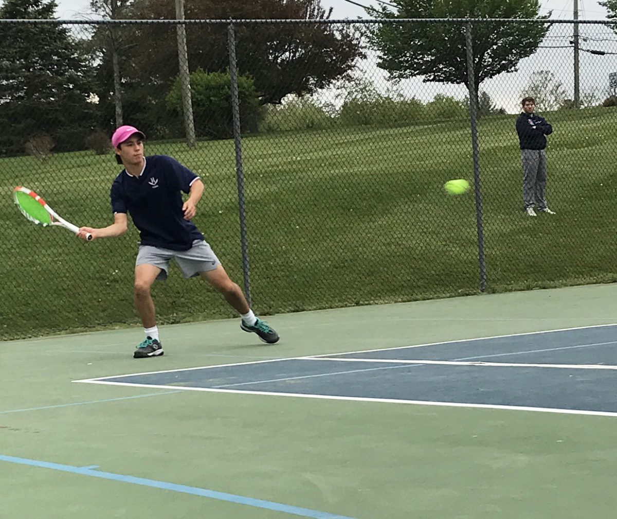 Julien Steins prepares to forehand the ball.