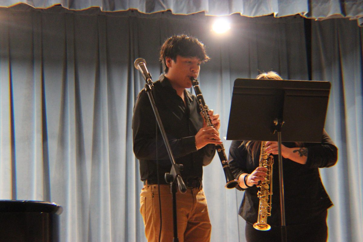 Sophomore Carlos Lopez performs a duet with Senior Erika Beck.