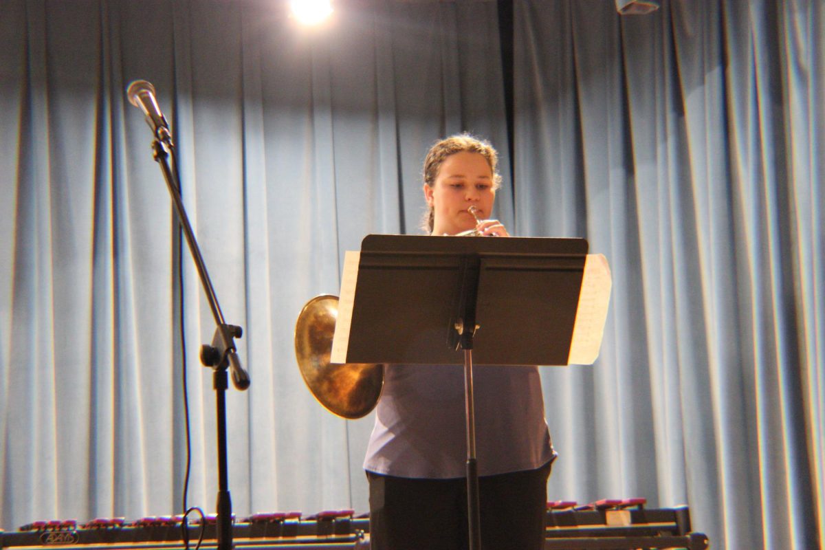 Junior Chloe Starling performs "Hunter's Moon" on the french horn.
