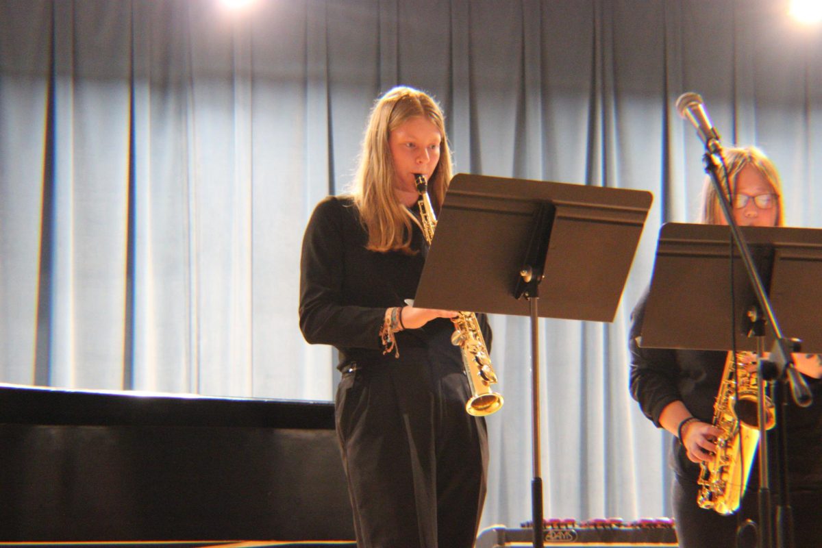 Junior Elaina Jones and Senior Erika Beck perform "Suite No.2 (For Jazz Sax Duo)