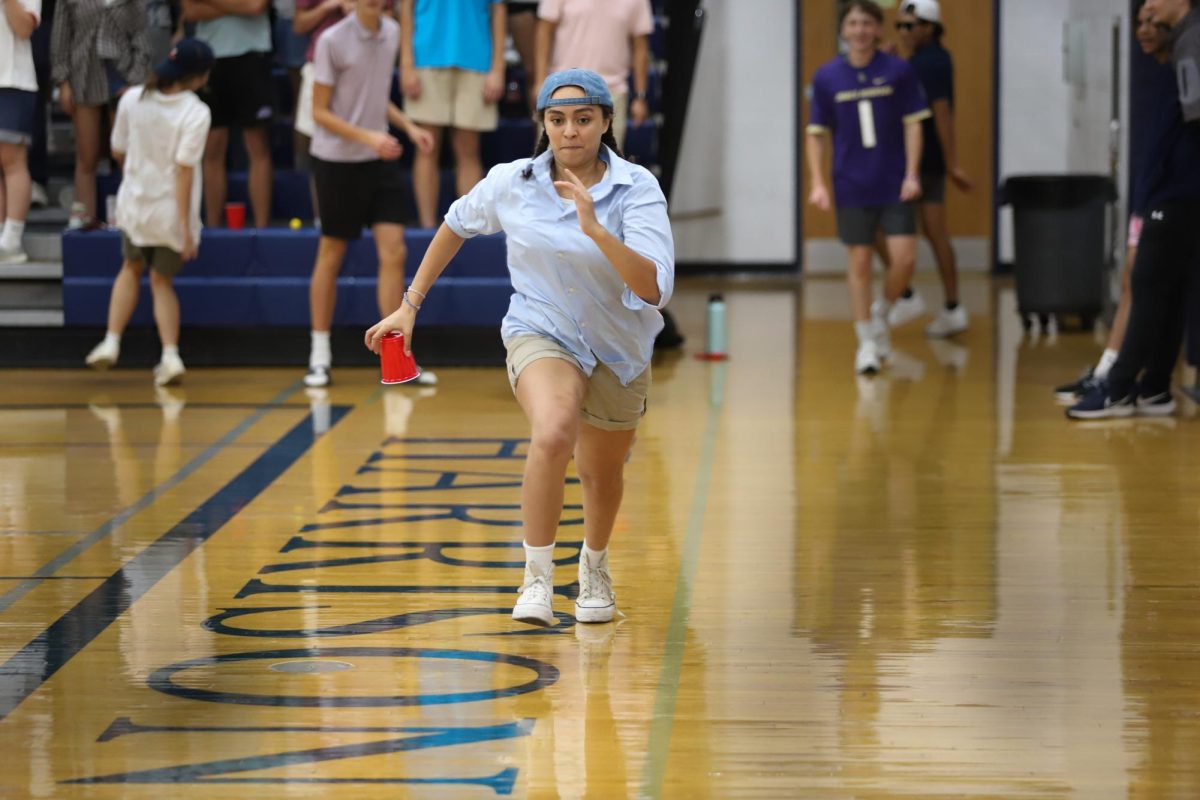 Senior Aiyanna Thornton runs during the Red Sea's relay race. 