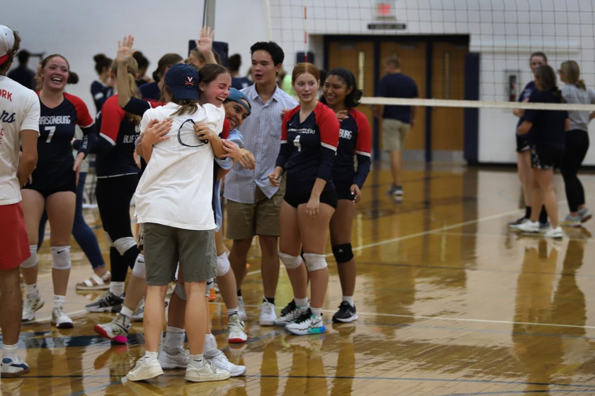 Senior Macy Waid celebrates with friends after win.