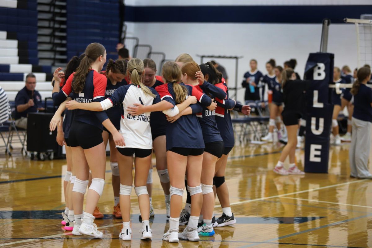 The team huddled together after their 3-2 win against Staunton. 