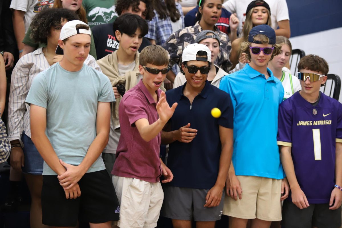 Broadway senior Asher Ryan throws ball during cup pong.