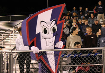 Our schools mascot is sitting in the student section watching the game