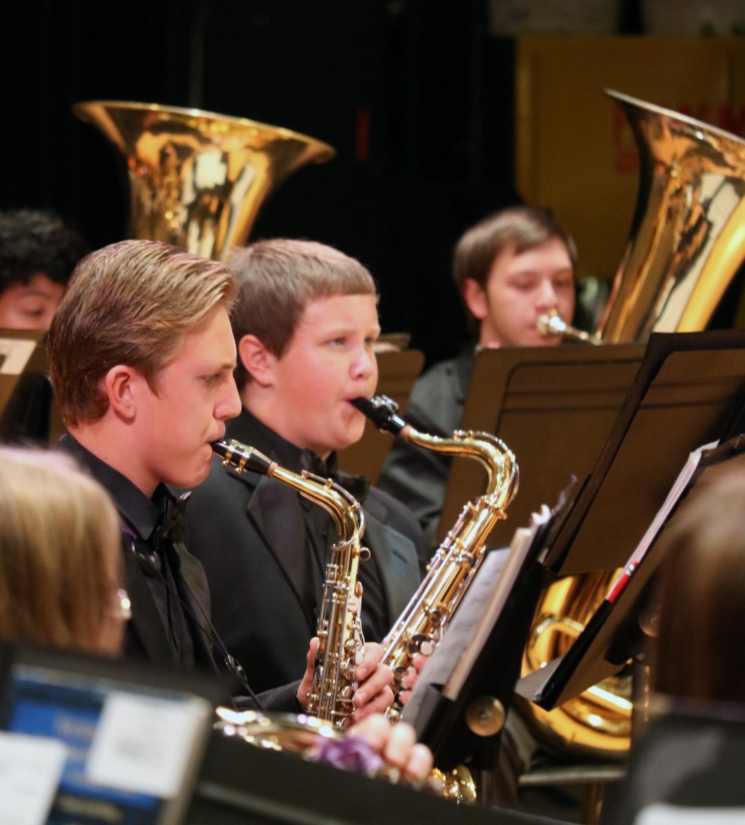 Freshmen Denys Popovych and Mateo Starling play saxophone.