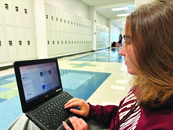 Junior Annie Snow creates a digital hall pass.