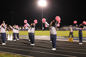 Sideline cheer, cheering on our Football players.