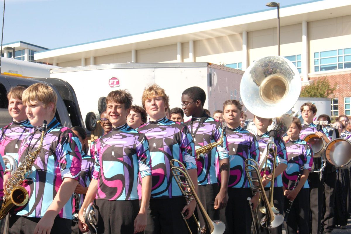 The Tuscarora high school marching band, “Marching Huskies”,gets ready to go on the field. The performers are determined to get a good score and are hopeful. The Marching Huskies get in lines of two to prepare for their performance “Dreamscape”.