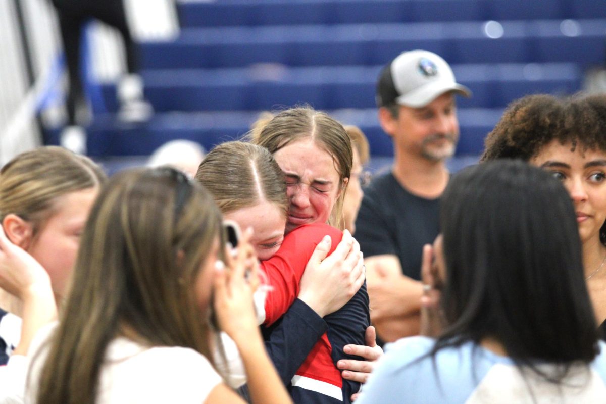 Waid and Gutierrez cry in each other's arms as they soak in one of their last moments together.