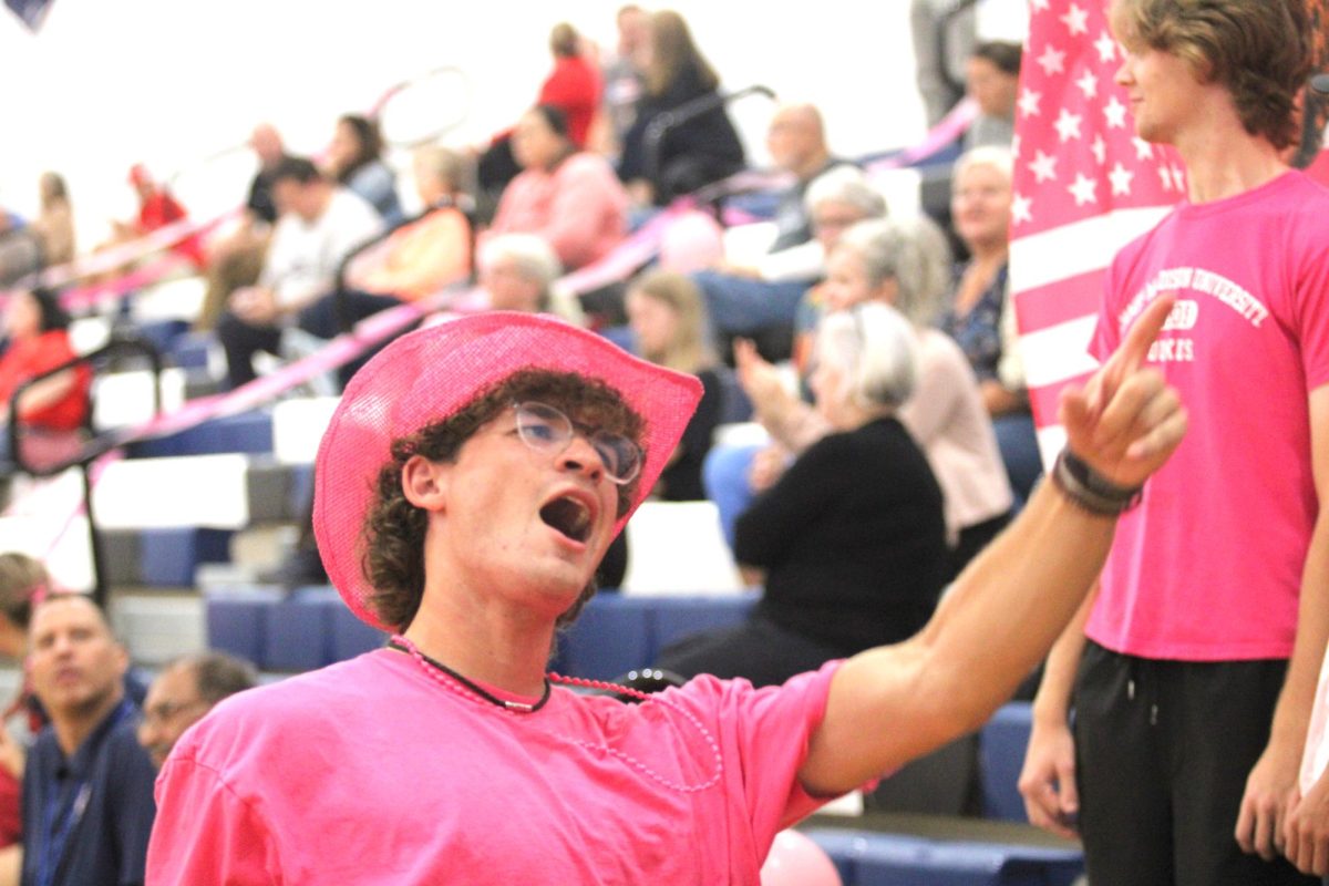 Bert leads the student section at every volleyball game.