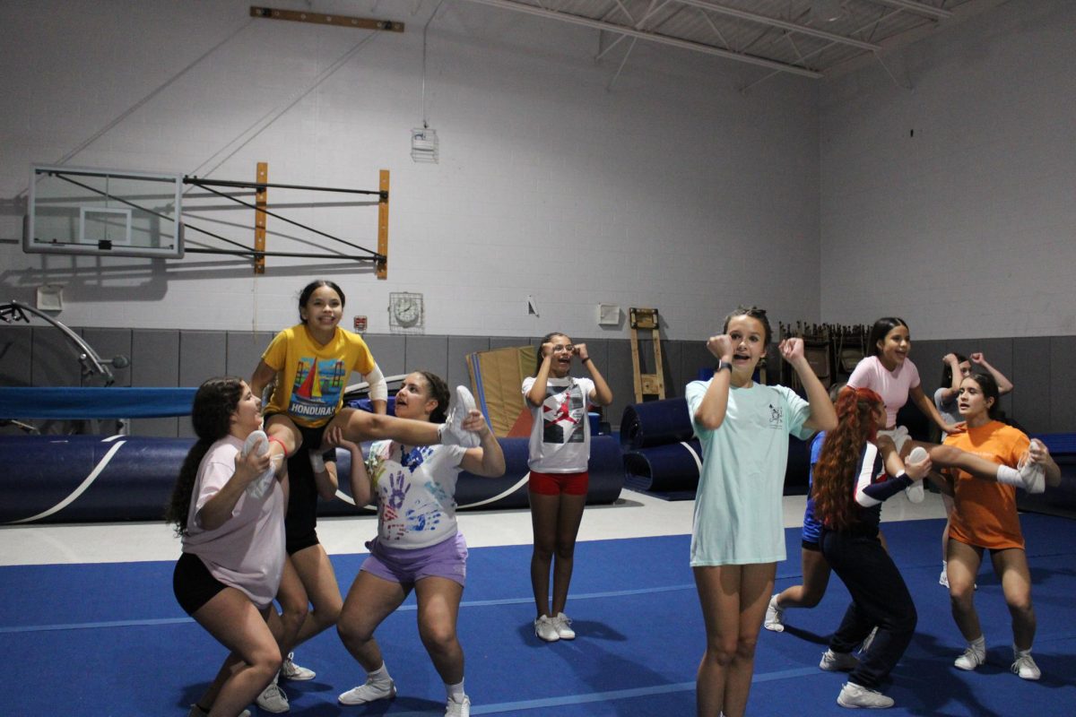 Freshmans Gretel and Mirna in a teddy bear stunt.