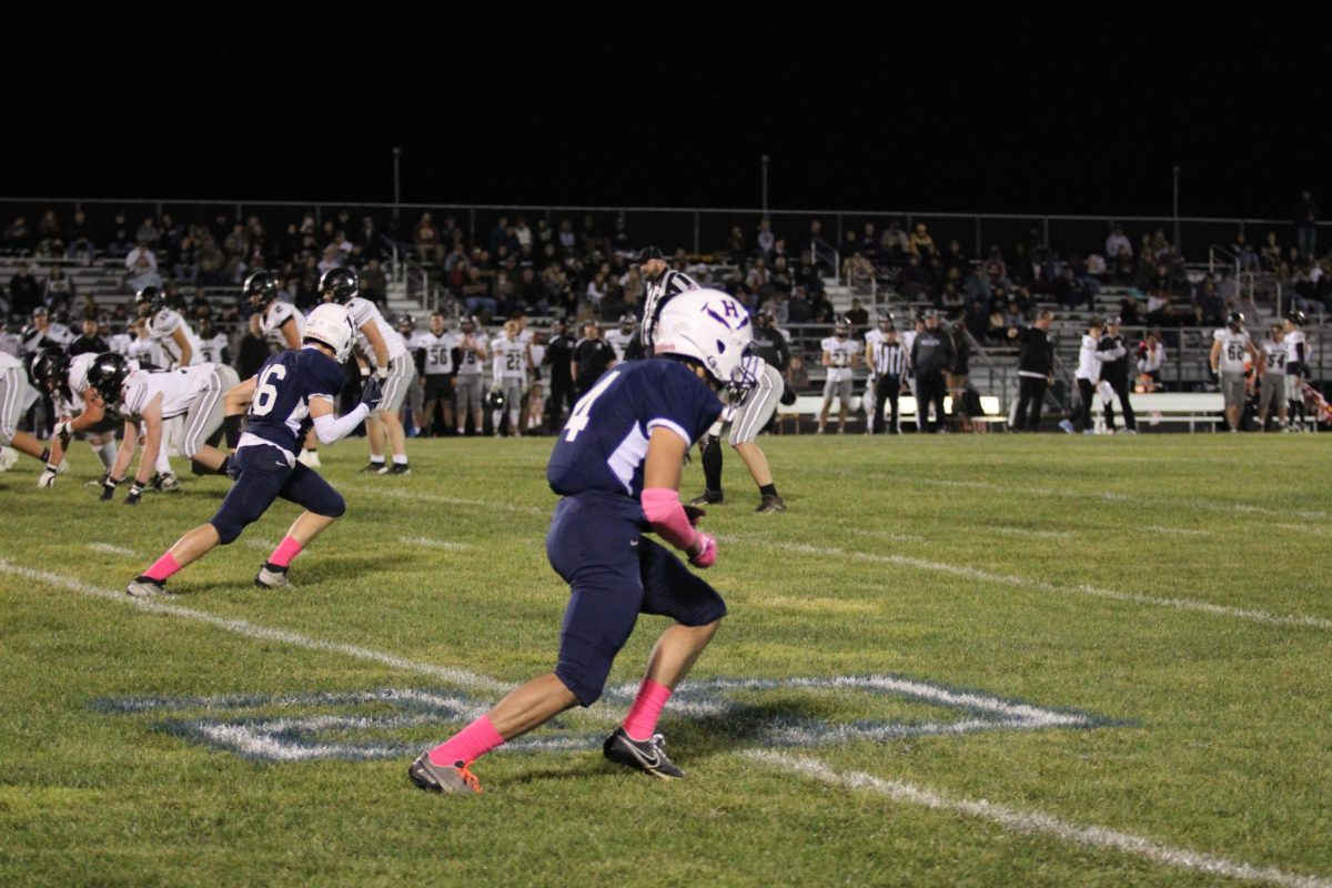 Wide Receiver and Defensive Back Lazaro Valdivia runs on defensive play. 