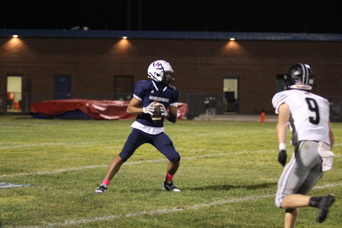 Senior Filipo Toelau catches a pass and looks to run upfield.