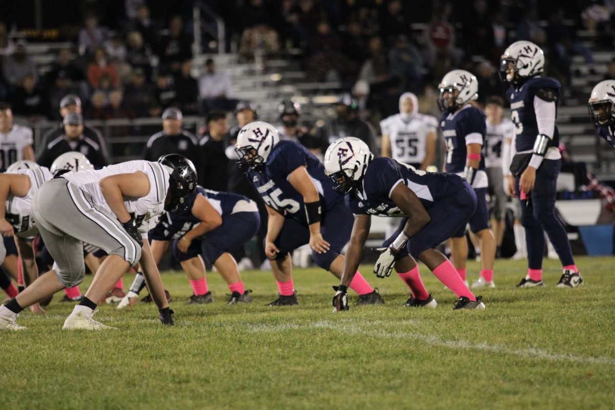 Seniors Mason Smith and Josue Martinez-Gonzalez line up to block the Knights defense.