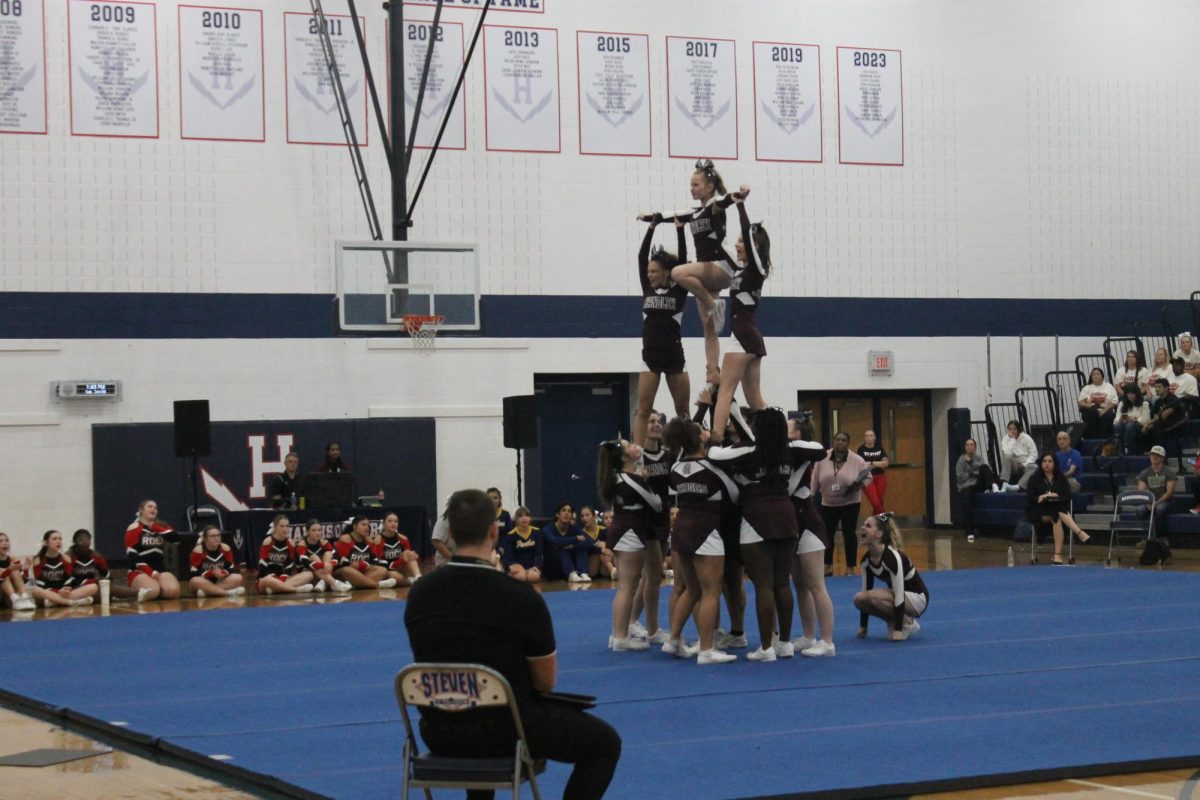 Cheer team bringing smiles to the crowd. While performing.