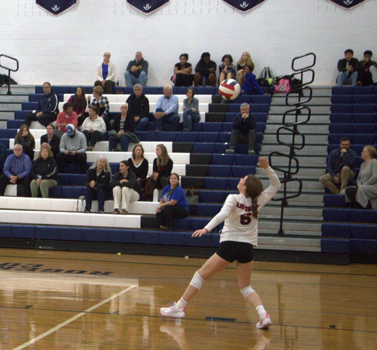 Kyleigh Morris serving the ball to Rocktown.