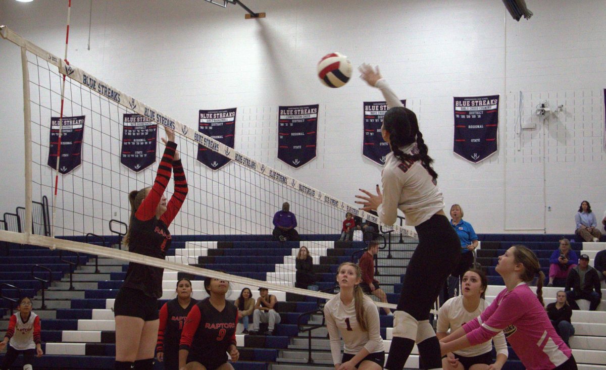 Leah Yoder hitting the ball.