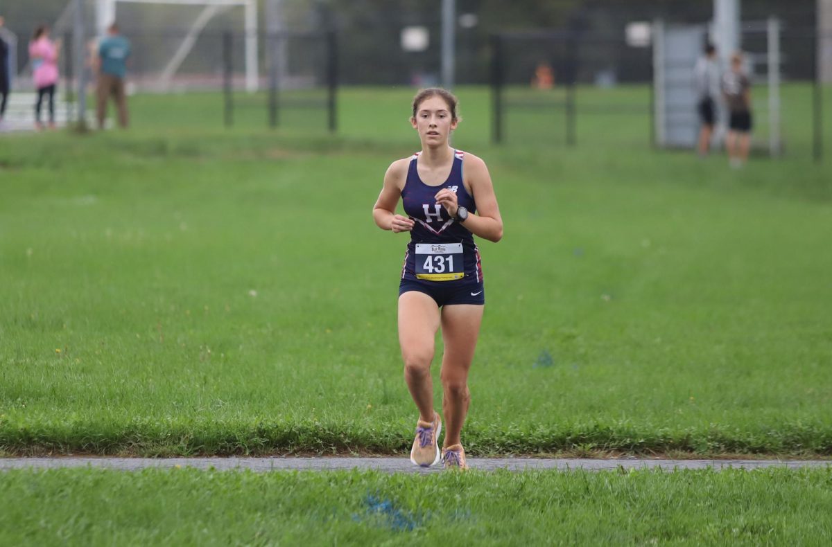 Junior Sophie Kauffman sprints to the finish line.