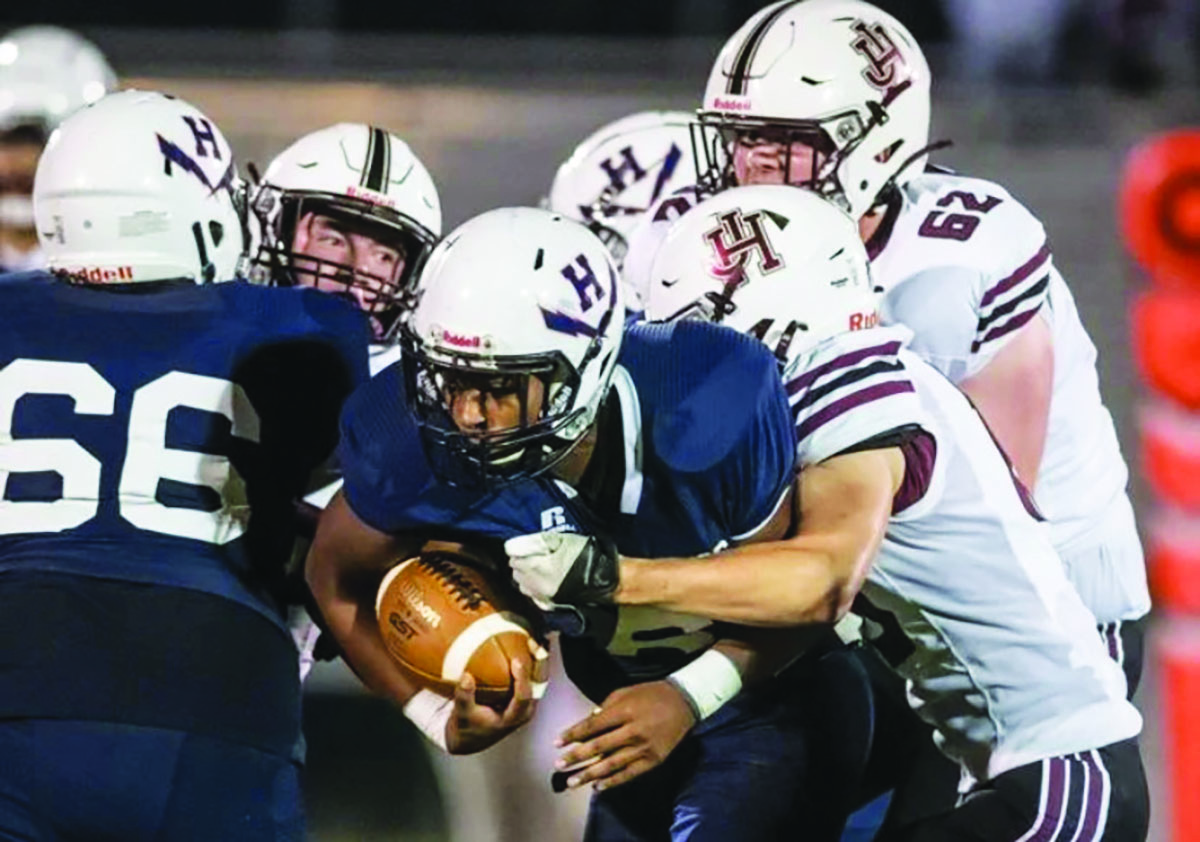 Junior Joel Friebe-Makinto plays one of his first games as a student at HHS.