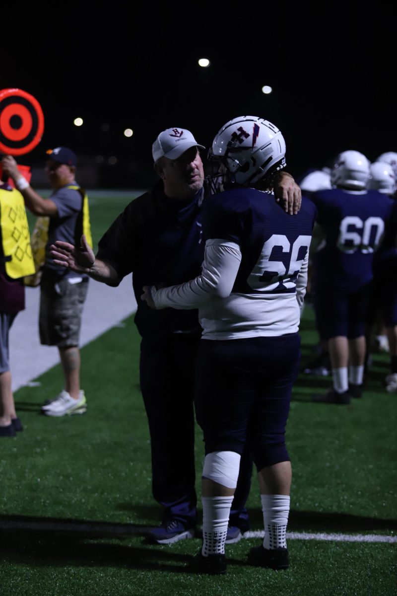 Junior Selvin Claros talking to coach gillenwater after making a mistake.