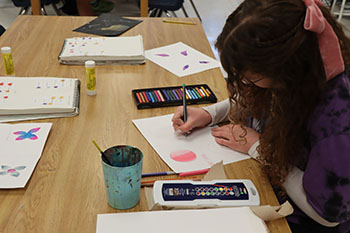 Junior Claire Keller is working on their ombre circles.