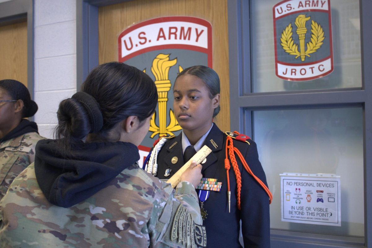 C/LTC Abril Paiz inspecting C/CPT Kamorah Roberts