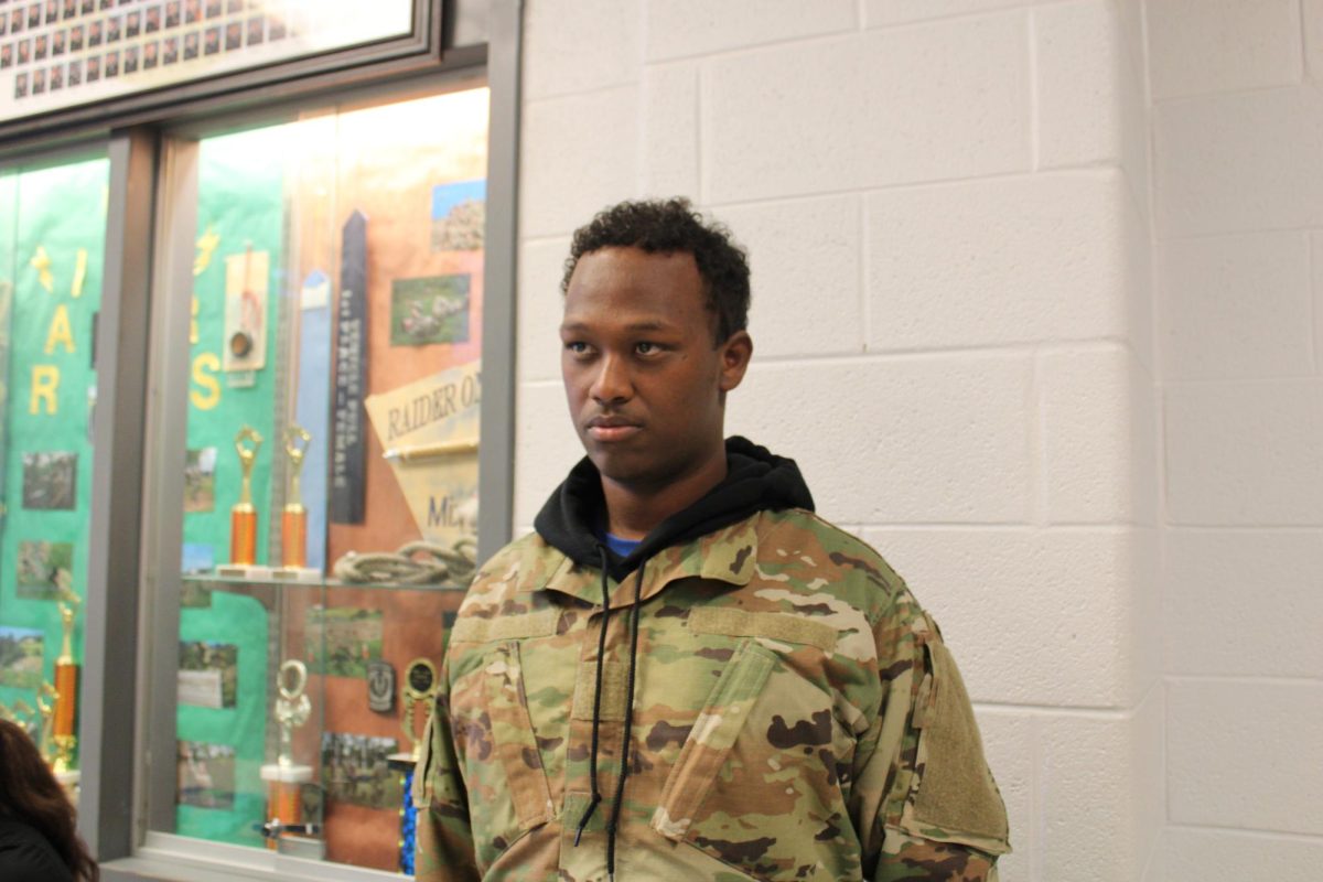 C/CPT Aron standing at attention as he waits for his turn to get inspected