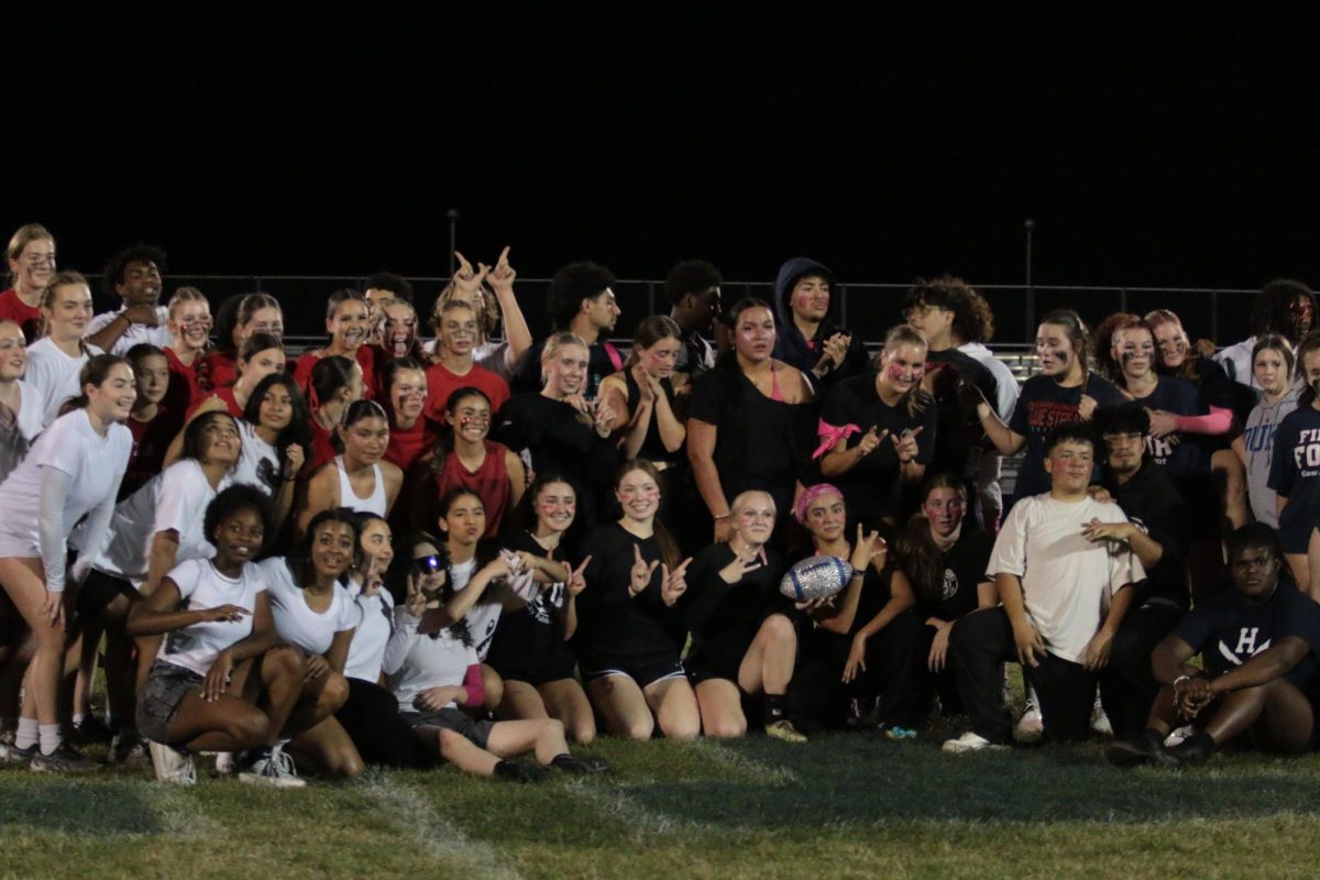 The freshmen,sophomores,juniors, and seniors together after the game.