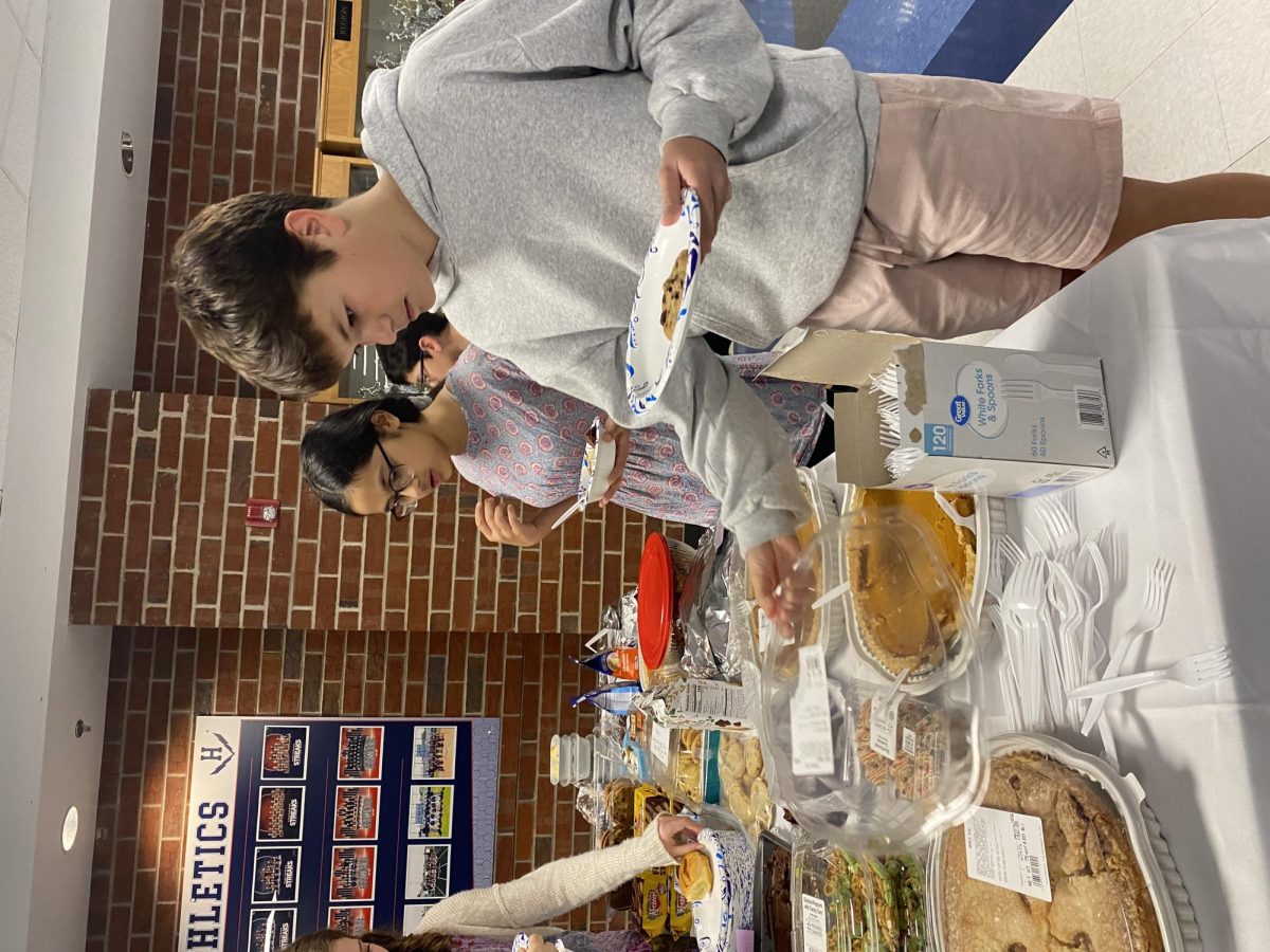 Freshman Carter Jenkins picks out his dessert at soup night.