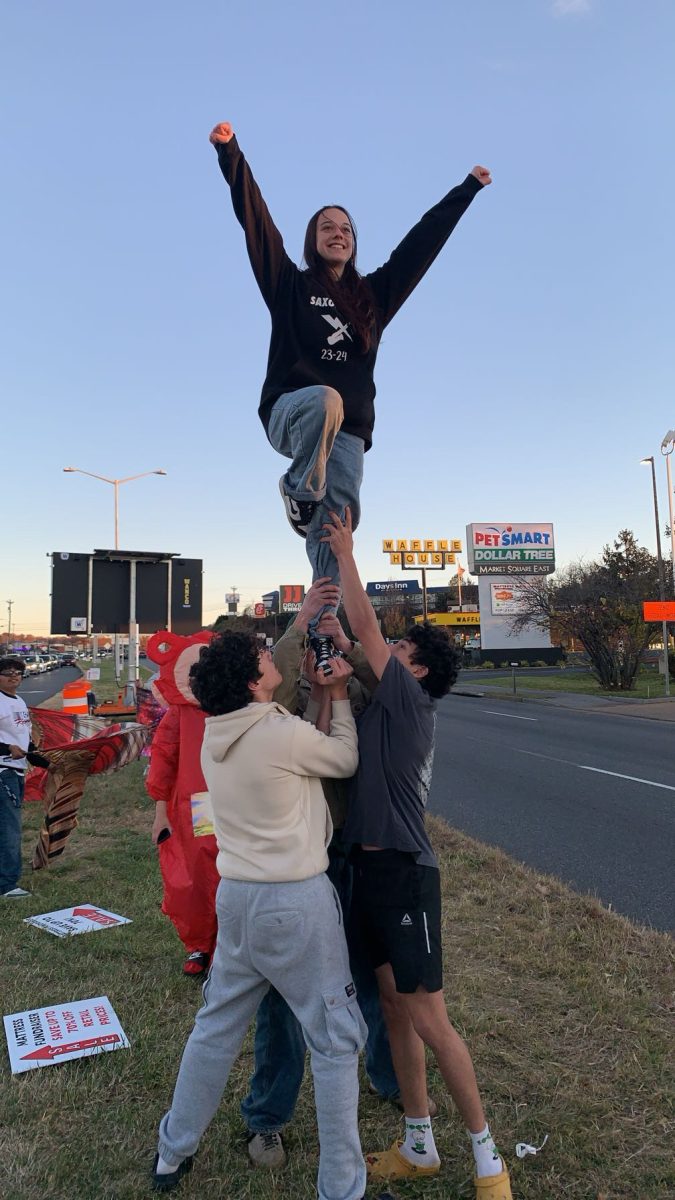 Ayca Cavusoglu Yalcin attracting attention with a cheer stunt. 